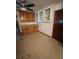 A neutral kitchen with cabinets, vinyl flooring, and a view to another room at 1130 Yeamans Hall Rd, Hanahan, SC 29410