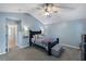 Charming bedroom with high ceilings, ceiling fan, and ensuite bathroom at 1136 Peninsula Cove Dr, Charleston, SC 29492