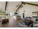 Vaulted porch with a seating area, tv, fire pit and bar for entertaining at 1136 Peninsula Cove Dr, Charleston, SC 29492