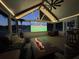 Outdoor living space with TV screen and view of lake at 1136 Peninsula Cove Dr, Charleston, SC 29492