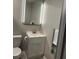 Clean bathroom with a vanity, and a modern, lighted mirror at 117 Fripp Ln, Summerville, SC 29483