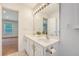 Bathroom features a double sink vanity with a large mirror and ample lighting at 122 Balsam Cir, Summerville, SC 29485