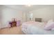Comfortable bedroom features carpeted floors, light walls, and a desk with drawers at 122 Balsam Cir, Summerville, SC 29485