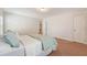 Bedroom with carpet, a large bed, and a view of a hallway at 122 Balsam Cir, Summerville, SC 29485