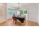 Dining room with hardwood floors and modern lighting at 122 Balsam Cir, Summerville, SC 29485