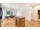 Bright dining room with hardwood floors and sliding door access to the outdoor space at 122 Balsam Cir, Summerville, SC 29485