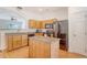 Well-lit kitchen with granite countertops, stainless appliances, and light wood cabinets at 122 Balsam Cir, Summerville, SC 29485