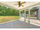 Inviting screened porch offers views of the spacious backyard and a seating area at 122 Balsam Cir, Summerville, SC 29485