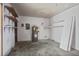 Unfinished basement features a water heater, shelving, and electrical panel at 123 Wheeler Rd, Summerville, SC 29486
