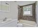 This bathroom includes a tub, shower, and a mirror at 123 Wheeler Rd, Summerville, SC 29486