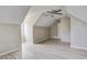 Upstairs bedroom with light-colored walls, angled ceilings, and wood-look flooring at 123 Wheeler Rd, Summerville, SC 29486