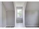 Attic bedroom with wood-look flooring, light-colored walls, and a window with outside views at 123 Wheeler Rd, Summerville, SC 29486