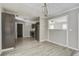 Bright dining area open to the kitchen with modern lighting and spacious layout at 123 Wheeler Rd, Summerville, SC 29486
