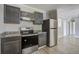 Kitchen featuring stainless steel appliances and stained wood cabinetry at 123 Wheeler Rd, Summerville, SC 29486
