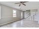 Inviting living room with a ceiling fan, light gray walls, and modern flooring at 123 Wheeler Rd, Summerville, SC 29486