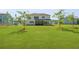 Large backyard with lush green lawn, screened porch, and young shade trees create a serene outdoor space at 1411 Homecoming Blvd, Ravenel, SC 29470