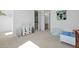 Bright bedroom with a door that leads to a private bathroom at 1411 Homecoming Blvd, Ravenel, SC 29470