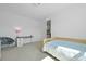 Sunlit bedroom featuring light walls, a comfortable chair, and natural light at 1411 Homecoming Blvd, Ravenel, SC 29470