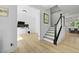 Spacious entryway featuring a staircase, office and bright flooring at 1411 Homecoming Blvd, Ravenel, SC 29470