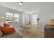 Bright living room with large windows offering neighborhood views at 1411 Homecoming Blvd, Ravenel, SC 29470
