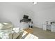 Well-lit home office with a comfortable chair and desk setup at 1411 Homecoming Blvd, Ravenel, SC 29470