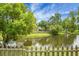 Picturesque view of the lake from the backyard, creating a peaceful and serene setting at 1485 Endicot Way, Mount Pleasant, SC 29466