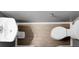 Compact bathroom with a pedestal sink, wood-look flooring, and a toilet at 1485 Endicot Way, Mount Pleasant, SC 29466