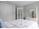 Bedroom featuring a four-poster bed with neutral decor and a closet at 1485 Endicot Way, Mount Pleasant, SC 29466