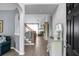 Elegant foyer with staircase leading to the upper level, complemented by stylish decor at 1485 Endicot Way, Mount Pleasant, SC 29466