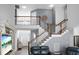 Grand foyer with a staircase, open landing, and a view of the front door and living area at 1485 Endicot Way, Mount Pleasant, SC 29466
