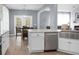 Beautiful kitchen overlooking dining area and Gathering room, stainless steel dishwasher and sink at 1485 Endicot Way, Mount Pleasant, SC 29466
