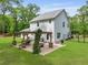 A backyard features a patio with pergola and manicured lawn at 1502 Southwick Dr, Johns Island, SC 29455