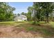 A large backyard and white home and patio offer plenty of space at 1502 Southwick Dr, Johns Island, SC 29455