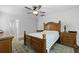 Bedroom featuring hardwood floors, ceiling fan, and a dresser at 1502 Southwick Dr, Johns Island, SC 29455