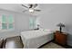Comfortable bedroom with two windows providing ample natural light and hardwood flooring at 1502 Southwick Dr, Johns Island, SC 29455