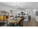 Beautiful kitchen with hardwood floors, white cabinetry, stainless steel appliances, and pendant lighting at 1502 Southwick Dr, Johns Island, SC 29455