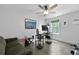 Bright office space featuring hardwood floors, natural light, and a modern ceiling fan at 1502 Southwick Dr, Johns Island, SC 29455