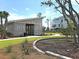Exterior of a recreation center with a slatted facade, near a paved walkway, lawn, and native landscaping at 1505 Fort Palmetto Cir, Mount Pleasant, SC 29466