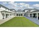 White building with a central courtyard covered with lush artificial turf at 1505 Fort Palmetto Cir, Mount Pleasant, SC 29466