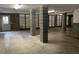 Unfinished garage space featuring gray concrete block walls, and ample room for storage and parking at 1505 Fort Palmetto Cir, Mount Pleasant, SC 29466