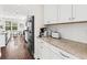 Modern kitchen featuring white cabinets, granite countertops, and stainless steel appliances at 1505 Fort Palmetto Cir, Mount Pleasant, SC 29466