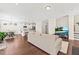 Spacious living area flowing into the kitchen, featuring hardwood floors at 1505 Fort Palmetto Cir, Mount Pleasant, SC 29466