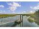 Marsh scenery featuring a dock pier with a platform, under a blue sky with scattered clouds at 1505 Fort Palmetto Cir, Mount Pleasant, SC 29466