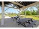 Spacious picnic pavilion with tables, overlooking a peaceful pond and neighborhood homes at 1505 Fort Palmetto Cir, Mount Pleasant, SC 29466