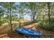 Spacious backyard features two kayaks for water enthusiasts and relaxation at 1522 Inland Ave, Charleston, SC 29412