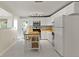 Bright kitchen with white appliances, cabinets, and an island at 1522 Inland Ave, Charleston, SC 29412