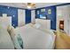 Cozy bedroom featuring a spacious bed and walk-in bathroom at 1522 Inland Ave, Charleston, SC 29412