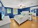 Stylish main bedroom featuring a ceiling fan and bamboo window shades at 1522 Inland Ave, Charleston, SC 29412
