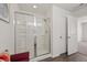 Bathroom featuring a glass-enclosed shower, a white door, and hardwood floors at 153 Wild Holly Dr, Moncks Corner, SC 29461