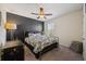 Stylish bedroom features a decorative accent wall, comfortable bed, and coordinated décor for a tranquil retreat at 153 Wild Holly Dr, Moncks Corner, SC 29461
